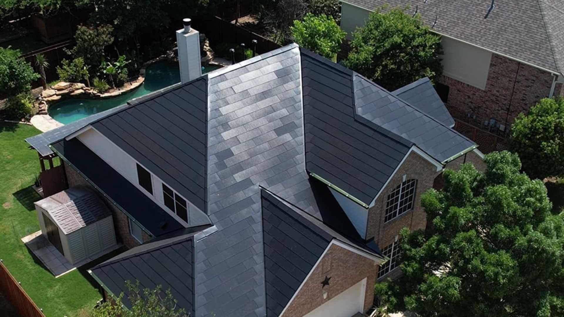 Tesla Solar Roof home with pool