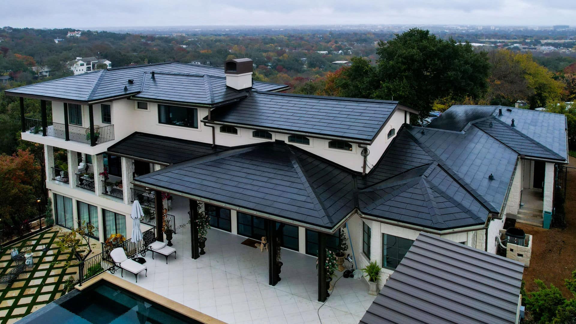 Tesla Solar Roof House with Pool