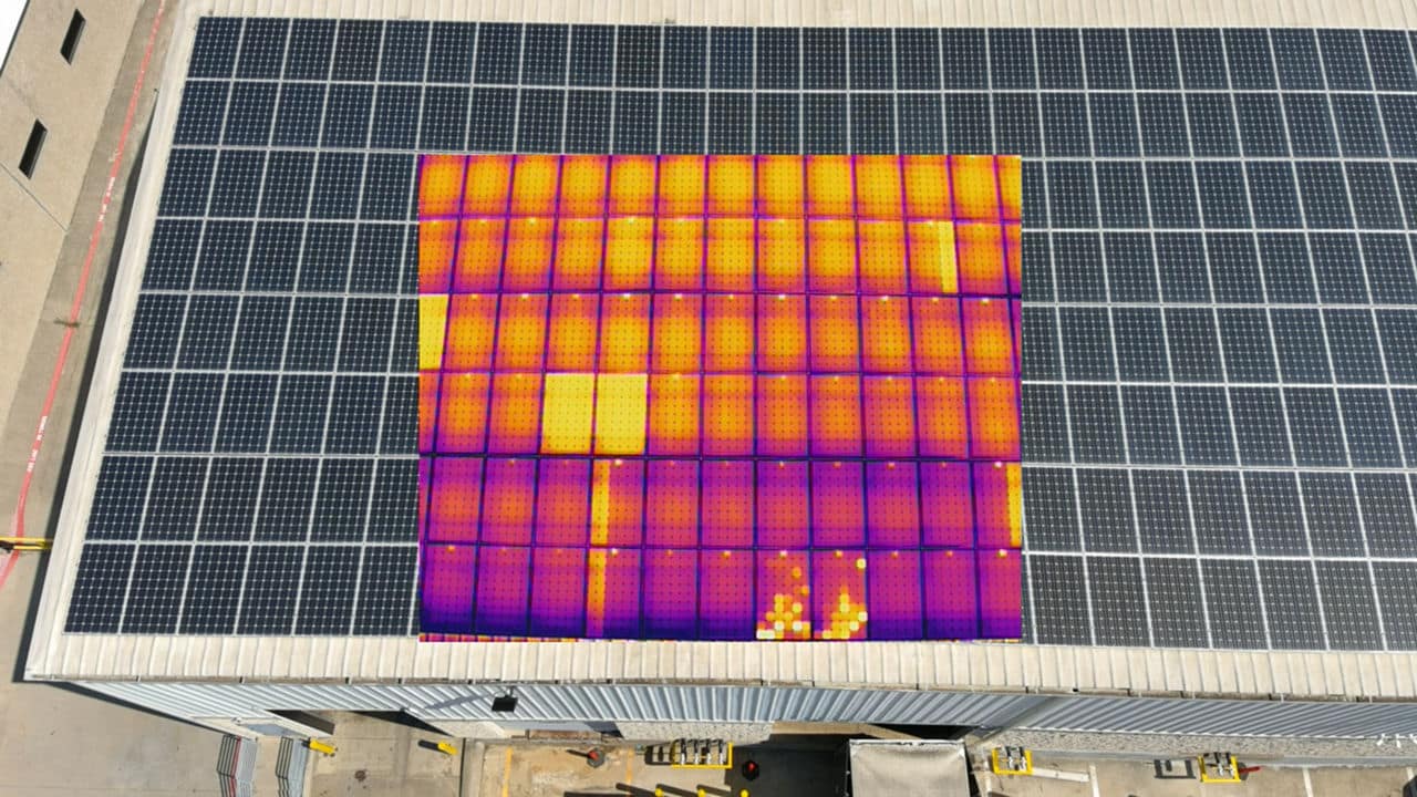 Thermal drone image showing solar panel hot spots