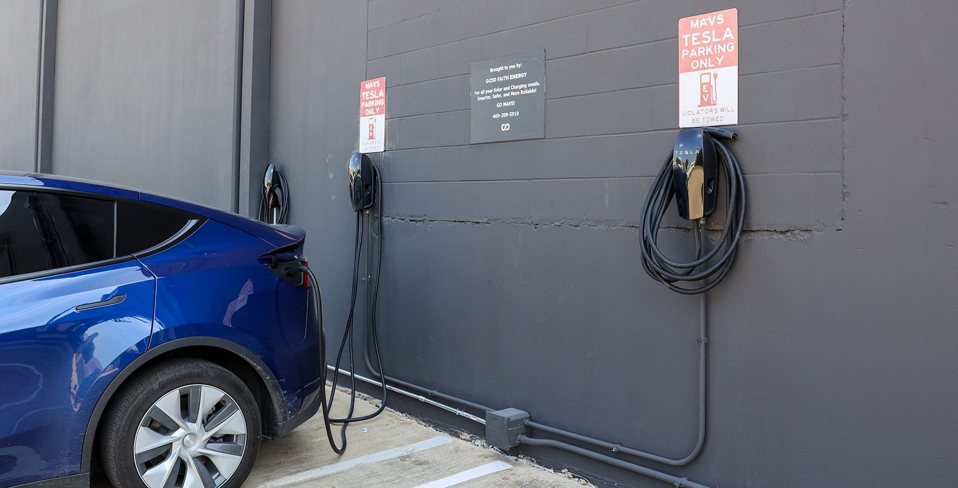 Tesla Wall Connector installed with car charging