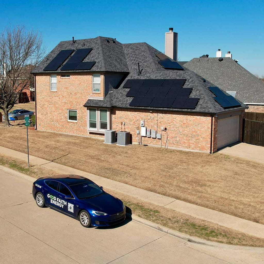 electric vehicle in front of house with solar