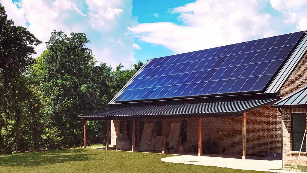 brick house with solar roof installed