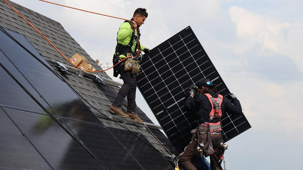 solar panels installation on the roof by Good Faith Energy