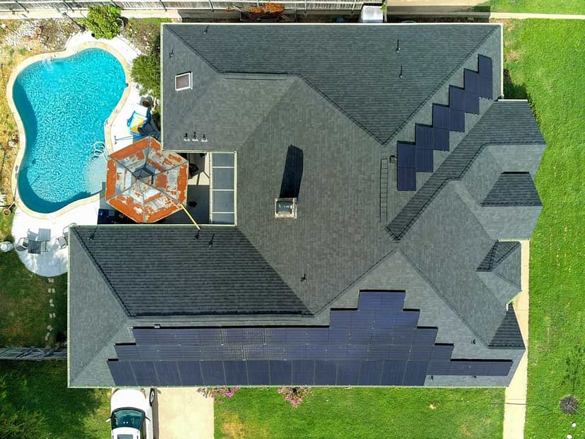 drone view of house with solar panels