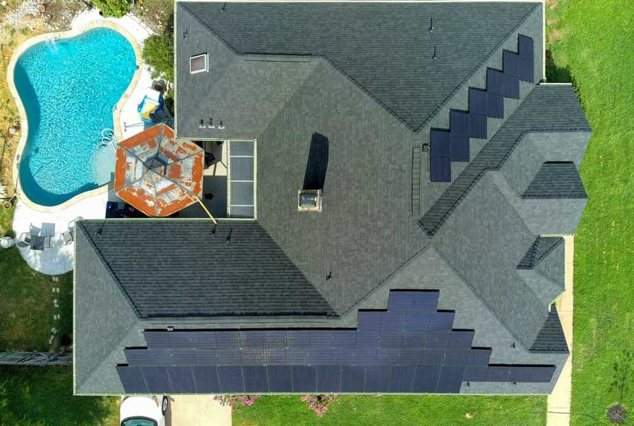drone view of house with solar panels