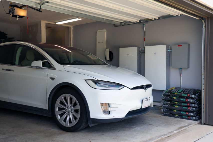 Garage with EV, Tesla Charger, and Powerwalls