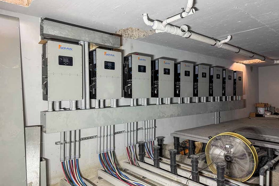 multiple sol-ark inverters mounted on wall