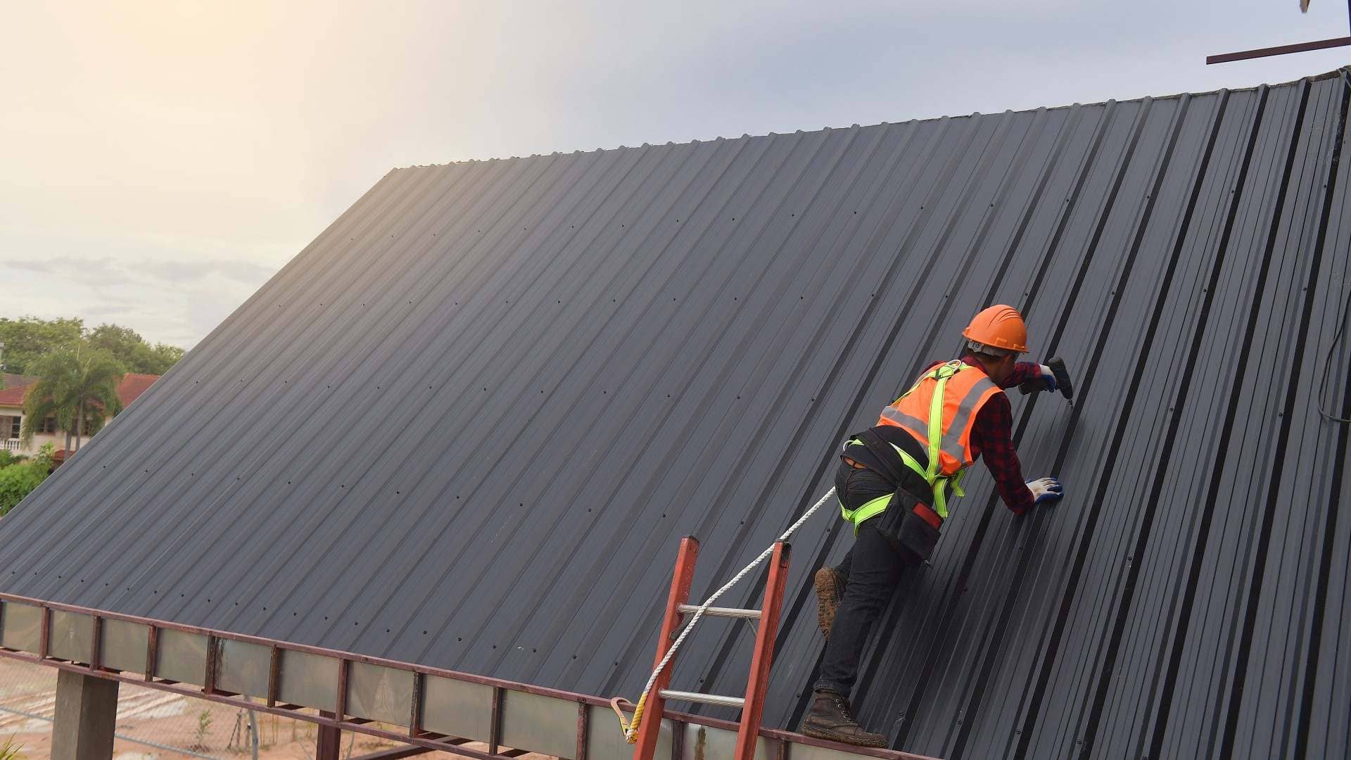 certified roofer wearing safety uniform