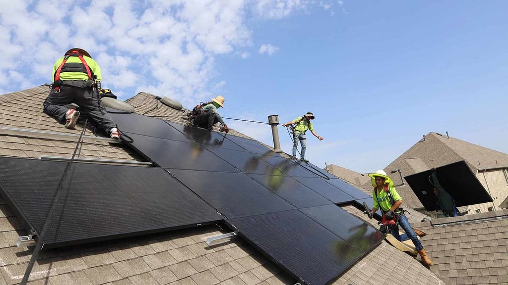 Good Faith Energy solar roof installers at work