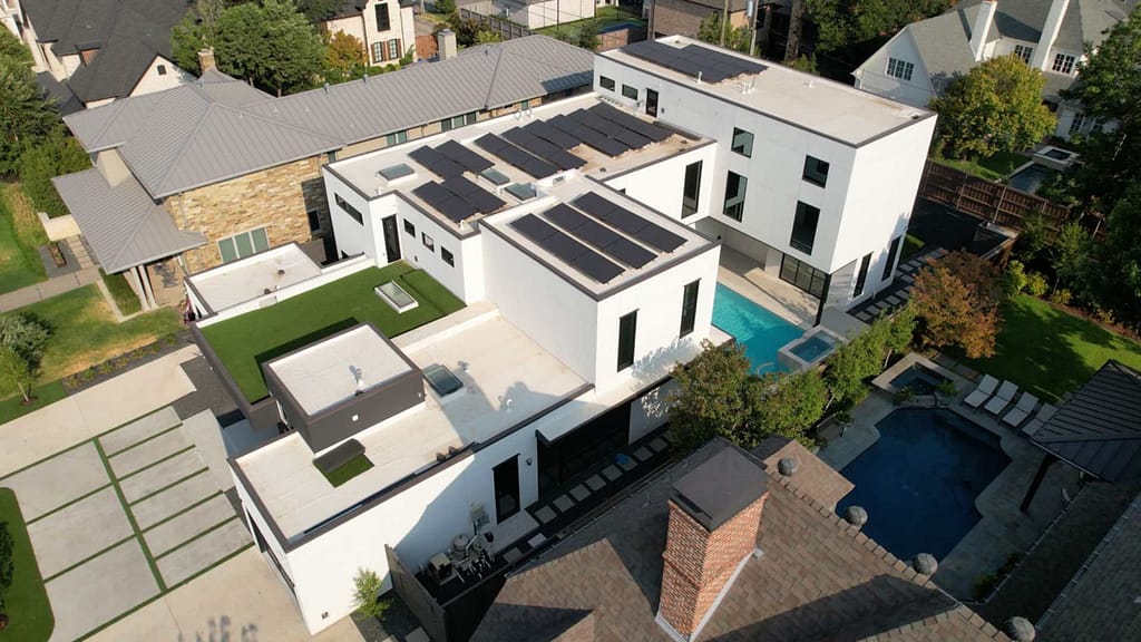 multiple solar panels installed on on flat roof