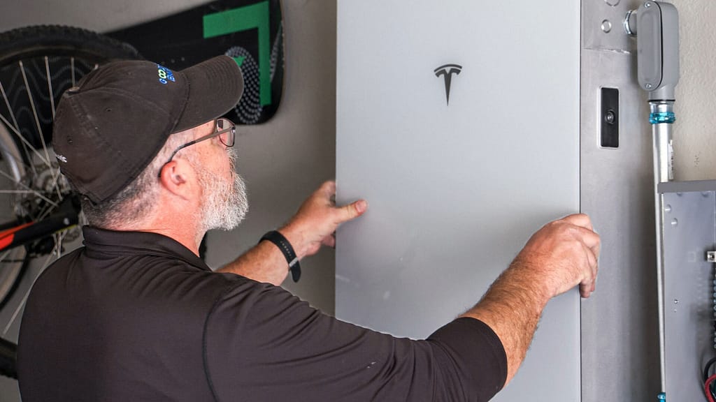 person installing the Tesla Powerwall 3