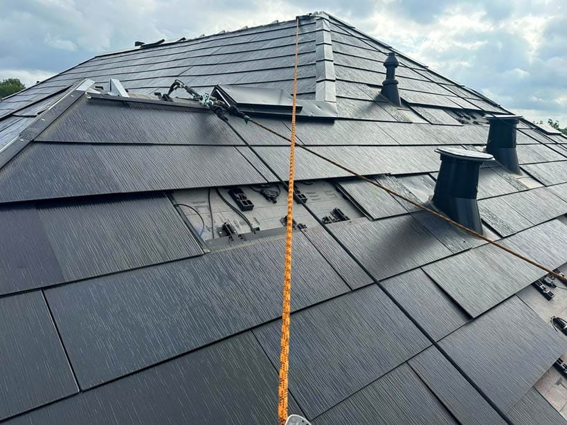 solar installer on roof